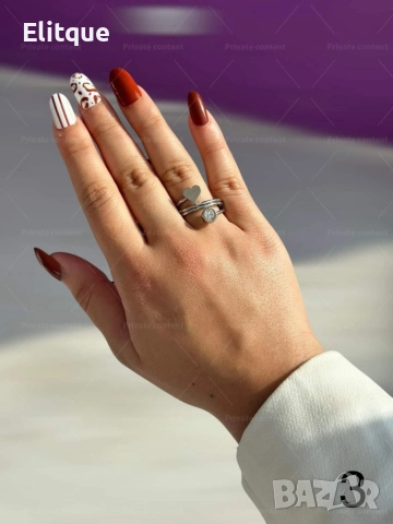 Сребрист дамски пръстен от медицинска стомана с интересен дизайн и декоративни елементи