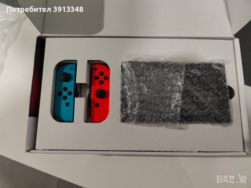 Конзола Nintendo Switch 32 GB с чифт джой-кони - сини/червени и 2 игри FIFA 22., снимка 1