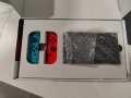 Конзола Nintendo Switch 32 GB с чифт джой-кони - сини/червени и 2 игри FIFA 22.