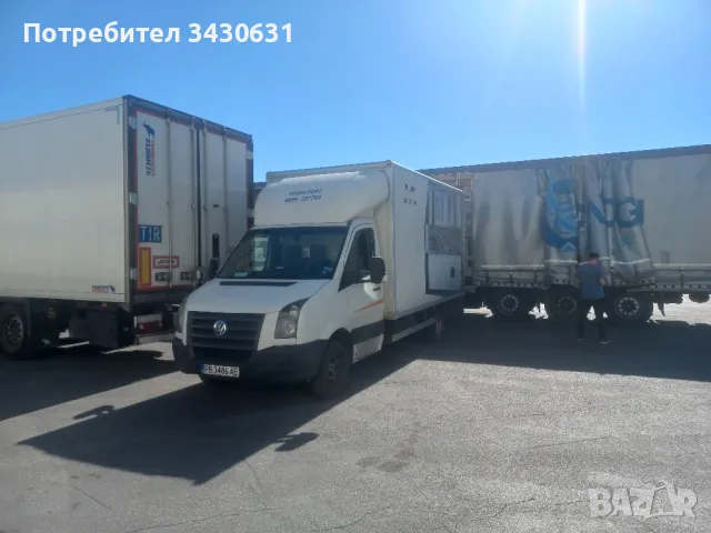 камион с падащ борд и палетна количка 