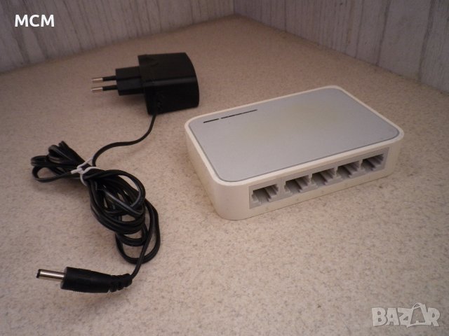 TP-Link SF1005D, снимка 5 - Суичове - 44094953