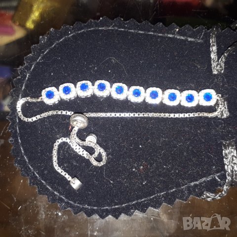 Сребърна гривна с диаманти и сапфири 