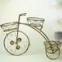 Поставка за 3 саксии - Колело, метална в златно, снимка 1