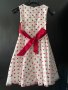 Бяла рокля на червени точки с панделка 7-8 годинки, снимка 3
