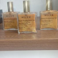 NUXE 100ml Nuxe Prodigieuse Сухо масло със златни частици за лице, коса и тяло x100 мл, снимка 1 - Козметика за лице - 31141640