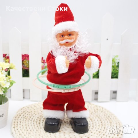 🎅 Музикален Дядо Коледа въртящ обръчи, снимка 1 - Музикални играчки - 42975437