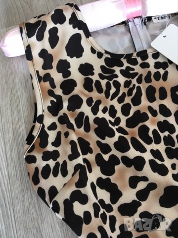 Нова разкроена рокля с леопардов принт, дължина до коляното, еластична, размер L, снимка 2 - Рокли - 39086484