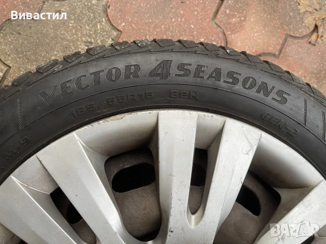 Джанти с гуми между болтове 4Х 100 централен отвор 54 R15 Мазда, снимка 3 - Гуми и джанти - 52606477