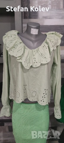 Дамска риза с дълъг ръкав.