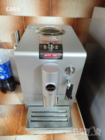 Кафе автомат Jura ena7 в добро състояние,прави хубаво кафе