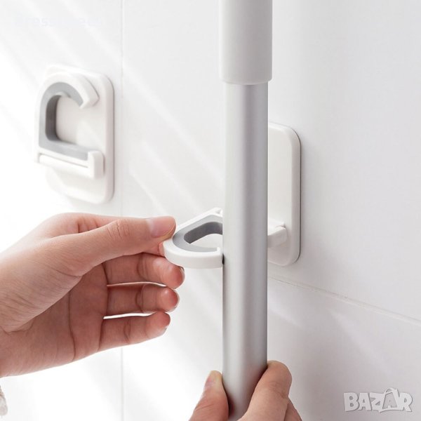 2599 Практична закачалка за дръжката на стирка или моп към стената, снимка 1