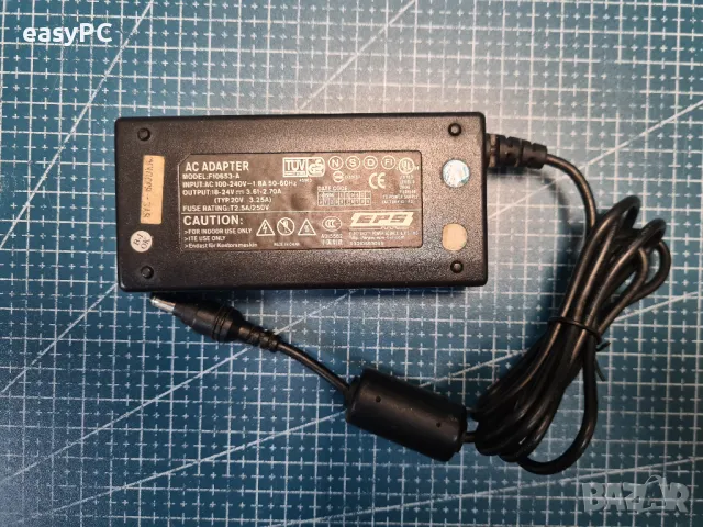 Оригинален захранващ адаптер E.P.S. INC. 18-24V 3.16-2.7A F10653-A, снимка 2 - Друга електроника - 48140096