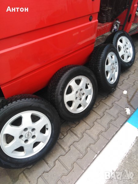 Джанти с  зимни гуми  за Опел Зафира пълен комплект с болтове и капачки, снимка 1