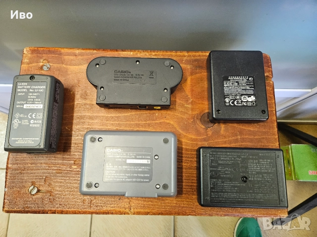 Зарядно за фотоапарат Olympus CASIO  Зарядно за батерия на фотоа, има зарядно и калъф за съхранение., снимка 2 - Батерии, зарядни - 52128509