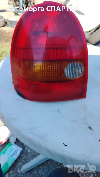 Ляв и десен стоп за Opel Corsa B, снимка 1