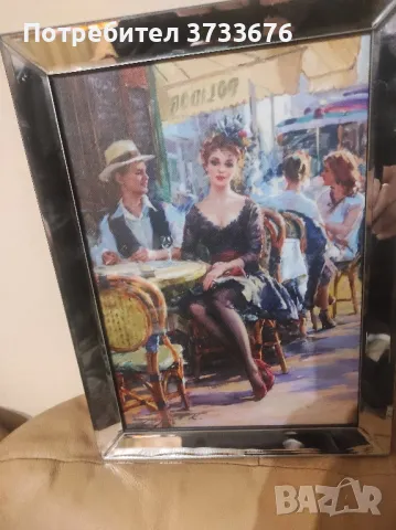 Картина на Реноар.На канаваца метална рамка.
