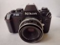 Аналогов фотоапарат Nikon F301 с адаптиран обектив Tessar 50mm 2.8, снимка 1 - Фотоапарати - 37253608