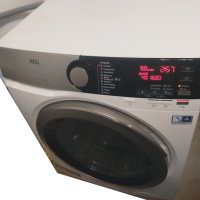 Продавам пералня със сушилня AEG в гаранция, снимка 1 - Перални - 43193017