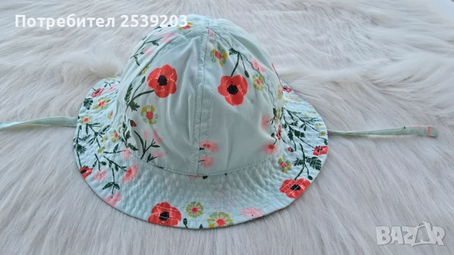 Бебешка шапка с връзки  4-9 месеца 