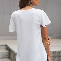 Дамска блуза в бял цвят с V-образно деколте и къси ръкави, снимка 2 - Други - 44862422