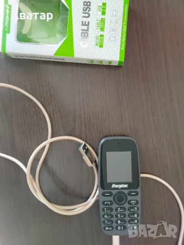 Телефон с кабел за зареждане