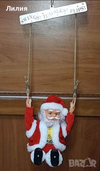  Музикален, премятащ се дядо Коледа, снимка 1