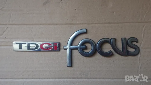 Оригинални емблеми заден капак форд фокус хечбег до 2004год. 