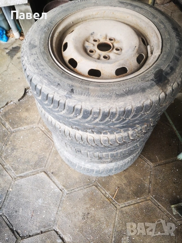 4 броя зимни гуми 185/70/14, снимка 2 - Гуми и джанти - 53229294