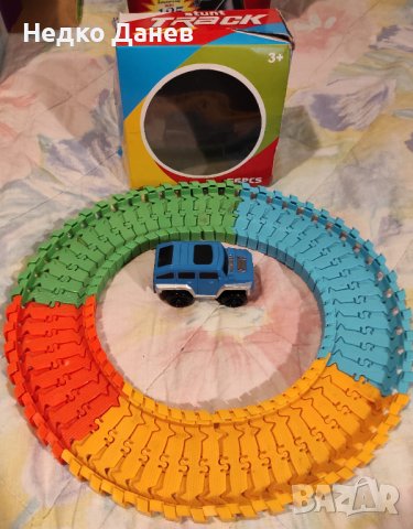 Количка със задвижване на писта