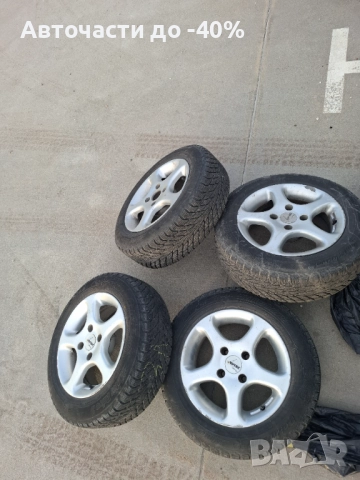 4 броя лети джанти 4х108 R14 65.1 ЕТ15 с 4 броя Зимни Гуми 175/65/14 Cordiant, снимка 1