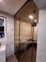 Стъклена преграда за баня