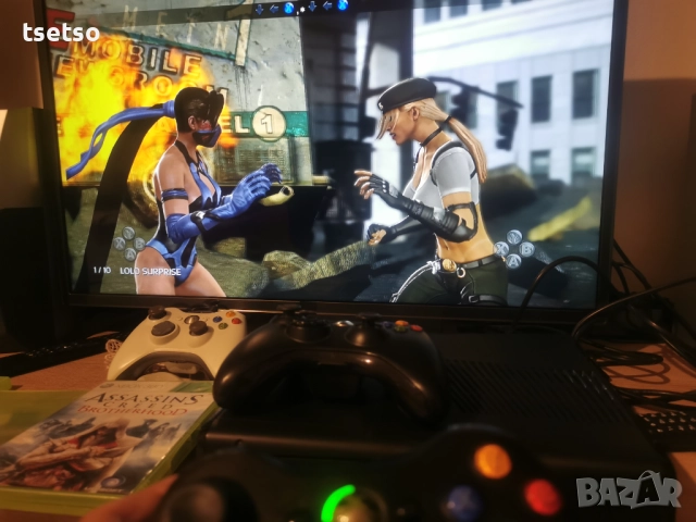 Xbox 360 Slim с 3 джойстика и дискове с 5 игри.