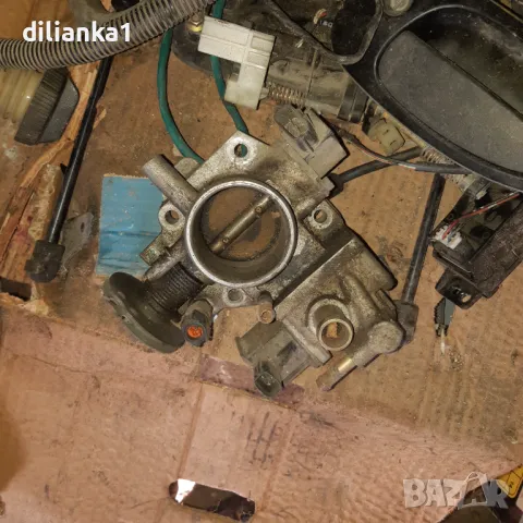 Дроселова клапа от Мазда 323