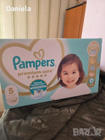88 броя Памперси Premium Care 5, снимка 2 - Пелени, памперси - 52846421
