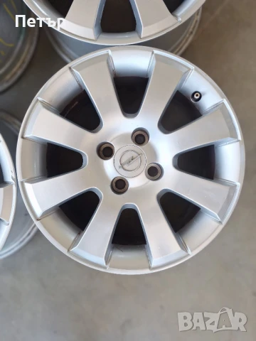 ОРИГИНАЛНИ АЛУМИНИЕВИ ДЖАНТИ ЗА OПЕЛ-4Х100Х56.6-15 цола, снимка 2 - Гуми и джанти - 50683476