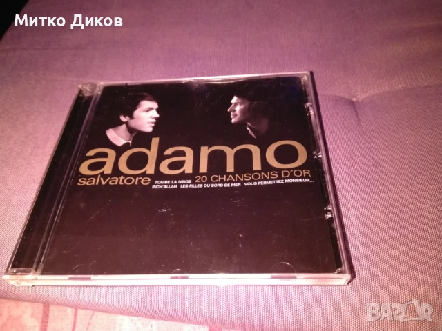 CD компилация със заглавие "20 Chansons D'or" от италиано-белгийския певец Салваторе Адамо. 1998г
