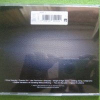 фънк албум в Гинес Jamiroquai - Travelling without moving CD, снимка 4 - CD дискове - 43016877