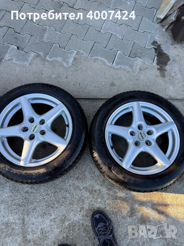 Зимни гуми с джанти 205/55 R16, снимка 8 - Гуми и джанти - 52403620