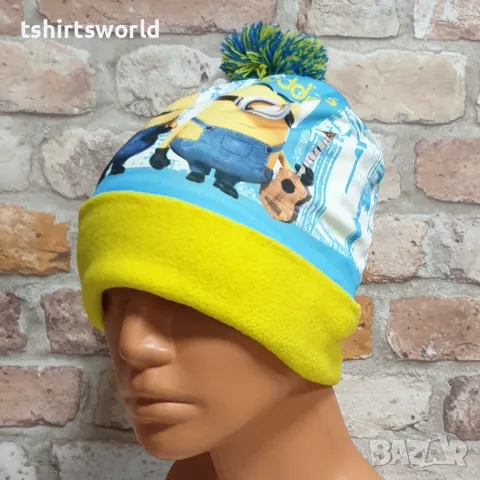 Нова детска зимна шапка с Миньони с помпон, снимка 2 - Шапки, шалове и ръкавици - 47894352