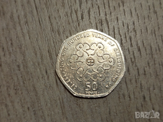 Монета 2010 Великобритания 50 pence 50p (100th Anniversary of Girlguiding) - Elizabeth II , снимка 2 - Нумизматика и бонистика - 51662038