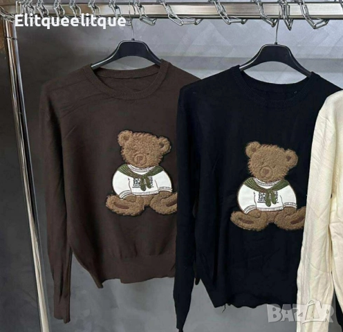 пуловер с мече