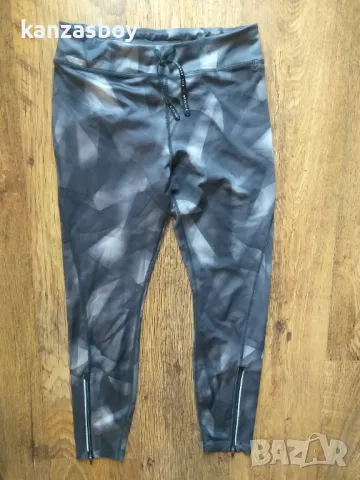 Nike Dri-fit - дамски клин р-р М, снимка 3 - Клинове - 49325519