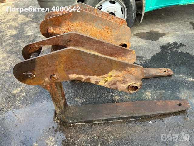 Палетни вилици за комбиниран багер