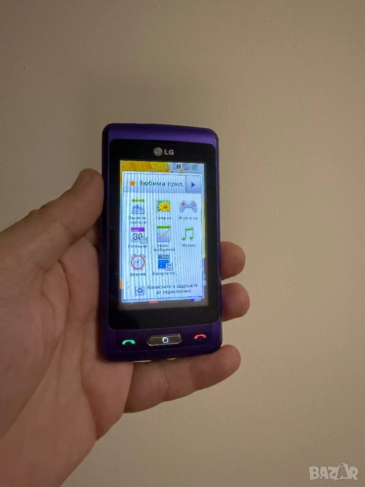 LG lg kp502 Purple Лилав бг меню, снимка 1