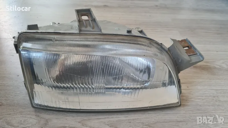 Фар Fiat Punto /176/ 96г десен Hella, снимка 1