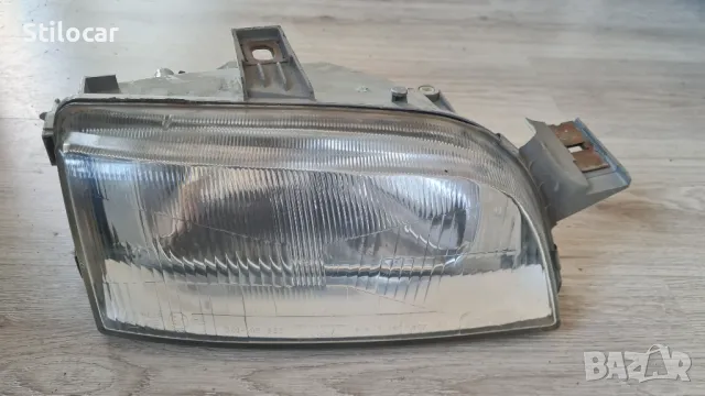 Фар Fiat Punto /176/ 96г десен Hella