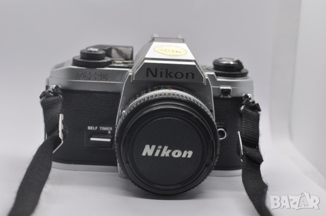 Фотоапарат Nikon FG-20 с обектив Nikkor 50mm f/1.8, снимка 1 - Фотоапарати - 43104294
