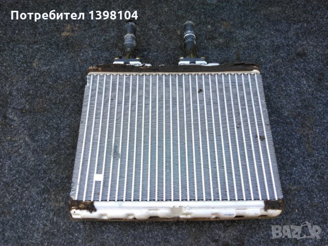 Радиатор парно за нисан примера п12, снимка 1 - Части - 32831736
