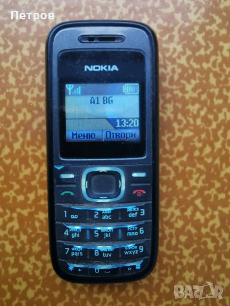 Телефон нокия 1208 с фенерче и заряно батерията не държи, снимка 1