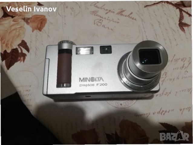 Фотоапарат Minolta Dimage F200, снимка 1 - Фотоапарати - 35152280